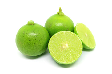Closeup heap of fresh limes isolated on white background