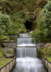 Obraz premium waterfall in the town of Cudillero, Asturias, spain