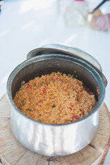 bulgur pilaf in a copper pot