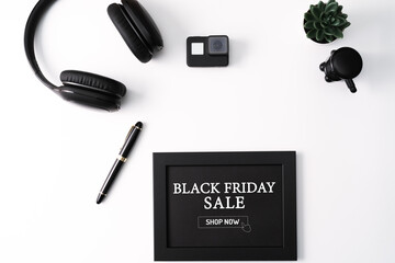 Black Friday Sale concept, Photo Frame, Action camera, Headphone