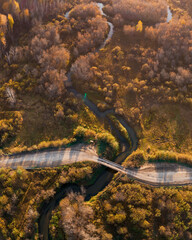 Aerial drone view of autumn landscape with river.