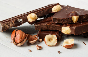 pieces of dark chocolate with hazelnuts