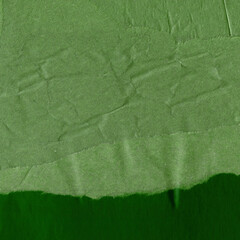 Colorful torn paper collage close-up. Texture made from various paper and cardboard parts. Damaged old paper background. Vintage blank wallpaper. Material design backdrop.