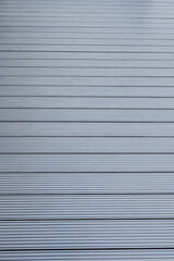 Dark gray or anthracite wpc material composite board deck for the construction of terrace.
