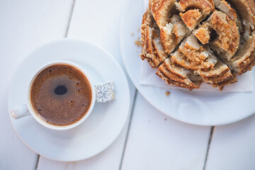 Turkish coffee and tahini donut on a white background.