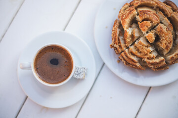 Turkish coffee and tahini donut on a white background.
