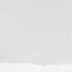 White torn paper collage close-up. Texture made from various paper and cardboard parts. Damaged old paper background. Vintage blank wallpaper. Material design backdrop.