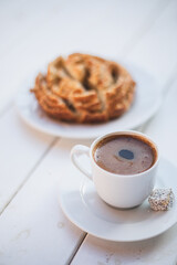 Turkish coffee and tahini donut on a white background.