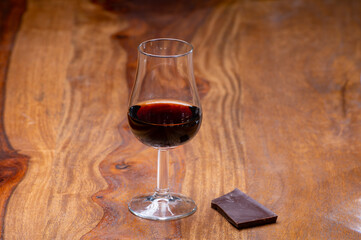 Tasting glass with strong alcoholic spirit drink whisky, cognac, armagnac or calvados