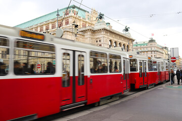 Fototapeta na wymiar Tram in front of Vienna's Opera house