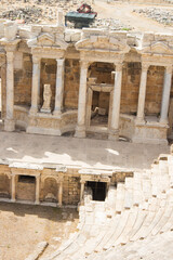 Fototapeta premium Ruins of the ancient town Hierapolis, Roman amphitheater in ruins, PAMUKKALE / TURKEY