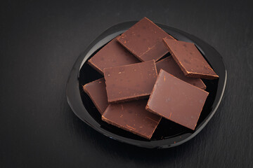Pieces of dark broken chocolate