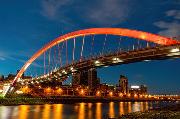 Fototapeta na wymiar Twilight view of the beautiful Rainbow Bridge
