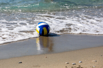 volleyball on the shore of the aegean sea during the day, in Turkey, resort, foam, off-season, horizontal