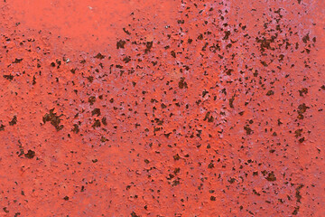 Beautiful photo of rust appearing on the painted metal