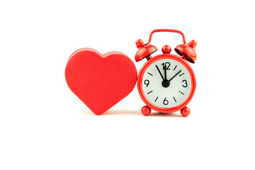 alarm clock and heart, the concept of love