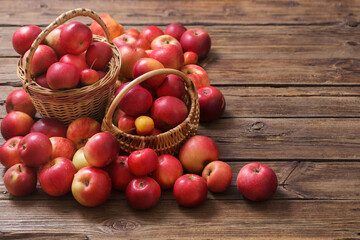 red apples on old wooden background