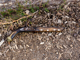 vintage Cossacks pistol. Close-up side view of an antique gun bolt.