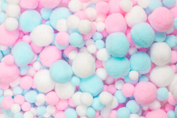 White, pink and blue soft pompons