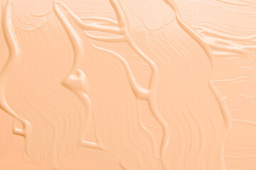 Liquid foundation texture. Make up for women. Top view.