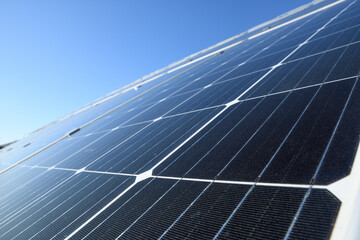 Solar panels against blue sky background.Against The Deep Blue Sky in suny weather