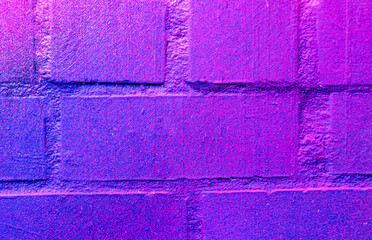 Art under ground. Beautiful street art graffiti background. The brick wall is decorated with abstract drawings house paint. Modern style urban culture of street youth. Abstract picture on wall