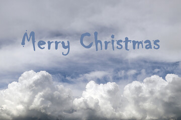 Merry Christmas text on white clouds