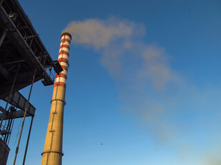 a tall, white and red chimney