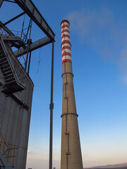 a tall, white and red chimney