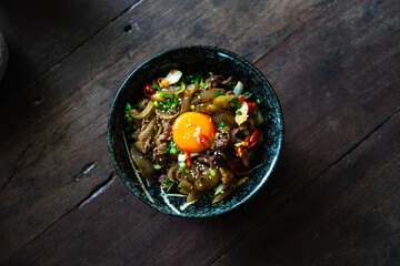 Beef Rice Bowl Which has been inspired by rice bowls from Japan, applied by adding pine chili to enhance the Thai cuisine