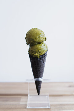 Green matcha ice cream cone