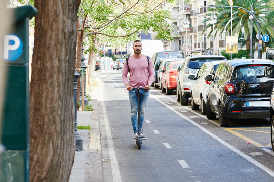 Man riding an electric scooter