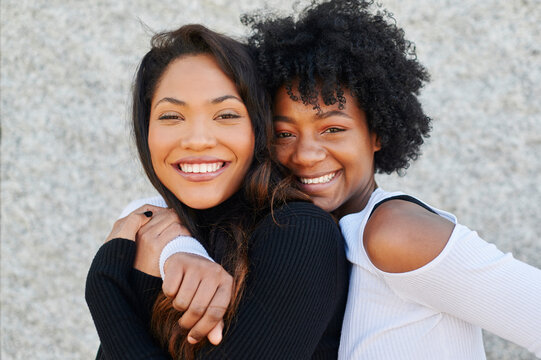 Smiling Friends Standing Outside