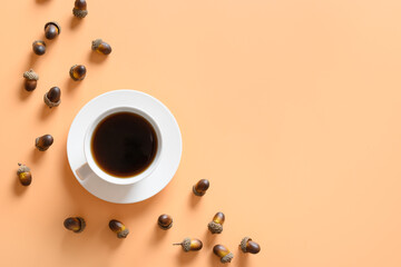Acorn coffee on beige table. Space for text.