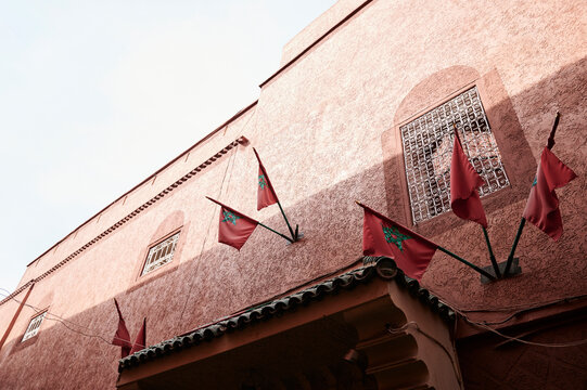 Moroccan facade with national flags