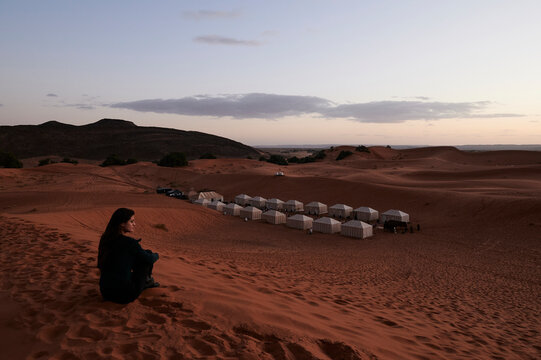Desert panorama dusk with tent camp