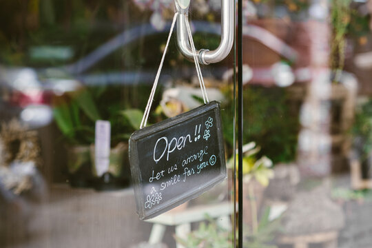 Open sign in doorway