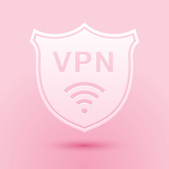 Paper cut Shield with VPN and WiFi wireless internet network icon isolated on pink background. VPN protect safety. Virtual private network for security. Paper art style. Vector.