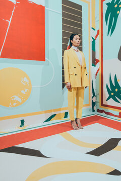 Fashion Model In Colorful Abstract Space .