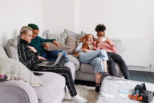 Teens hanging out together at home