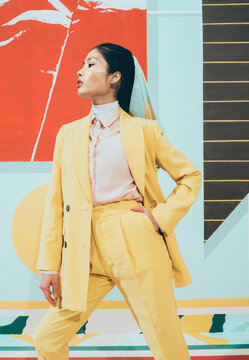 Fashion Model In Colorful Abstract Space .