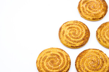 Round cookies sprinkled with sugar. Round cookies. Curled cookies with sugar.