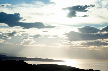 Cloudy sunset by the atlantic ocean at the cliffs of Cantabria, Spain