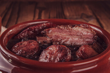Brazilian feijoada with smoked pork ribs, loin and sausage