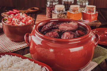 Brazilian feijoada with smoked pork ribs, loin and sausage