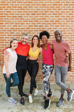 Sporty Friends Standing Outside Together