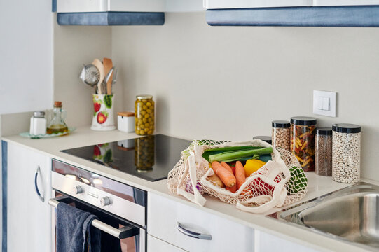 Shopping bag of food on a kitchen counter
