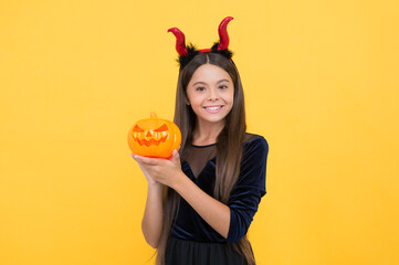 cute face. funny teen girl ready to celebrate party. costume party fun. happy halloween. child in...