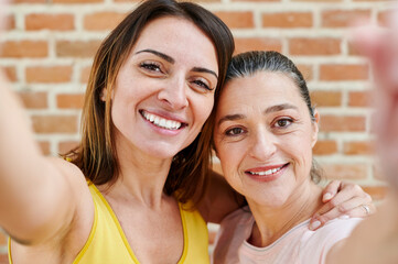 Sporty women taking selfies outside
