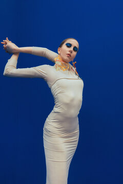 Fashion Gymnastic In Blue Abstract Space .